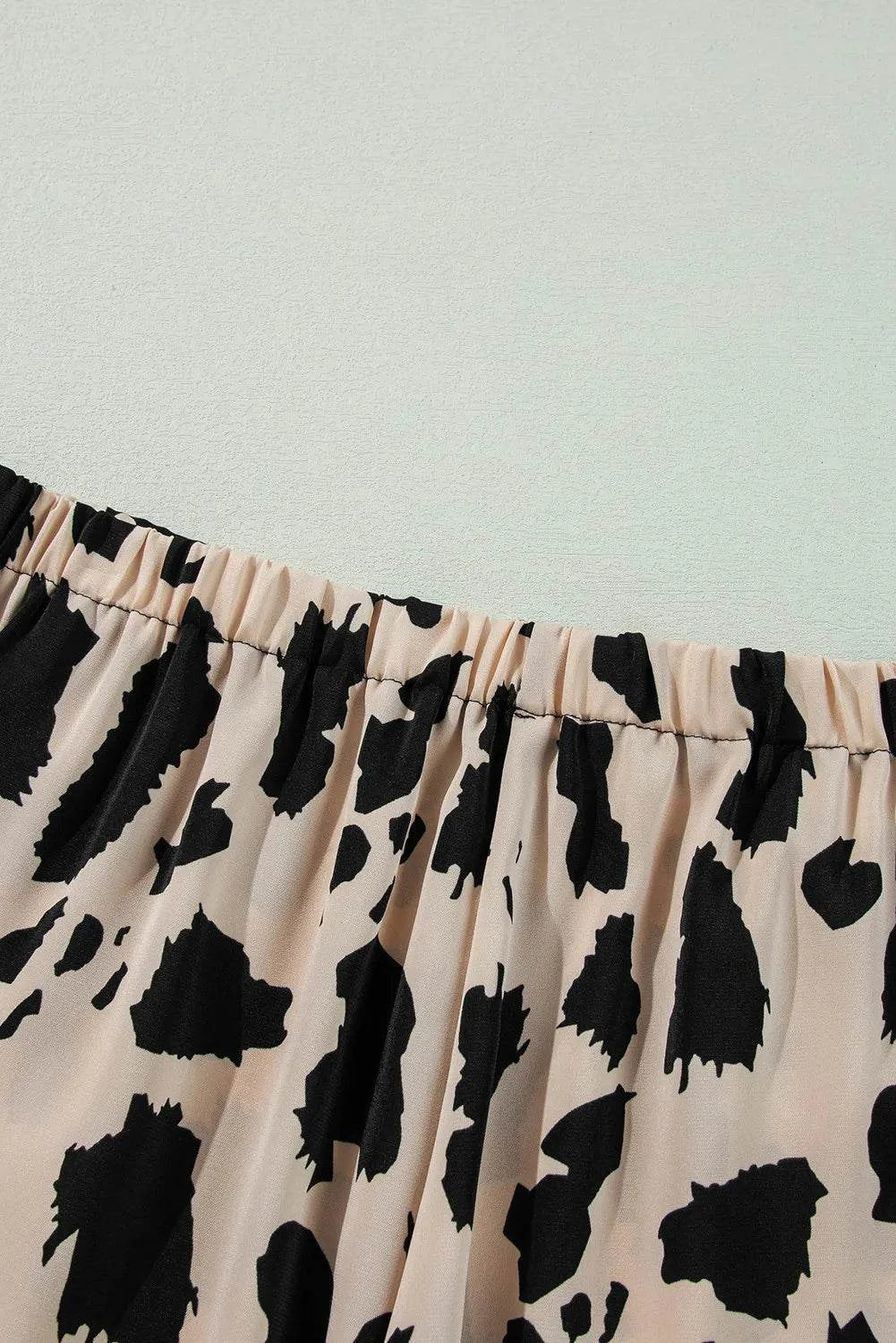 Button up long sleeve top and pants lounge set with abstract black and beige print and elastic waistband