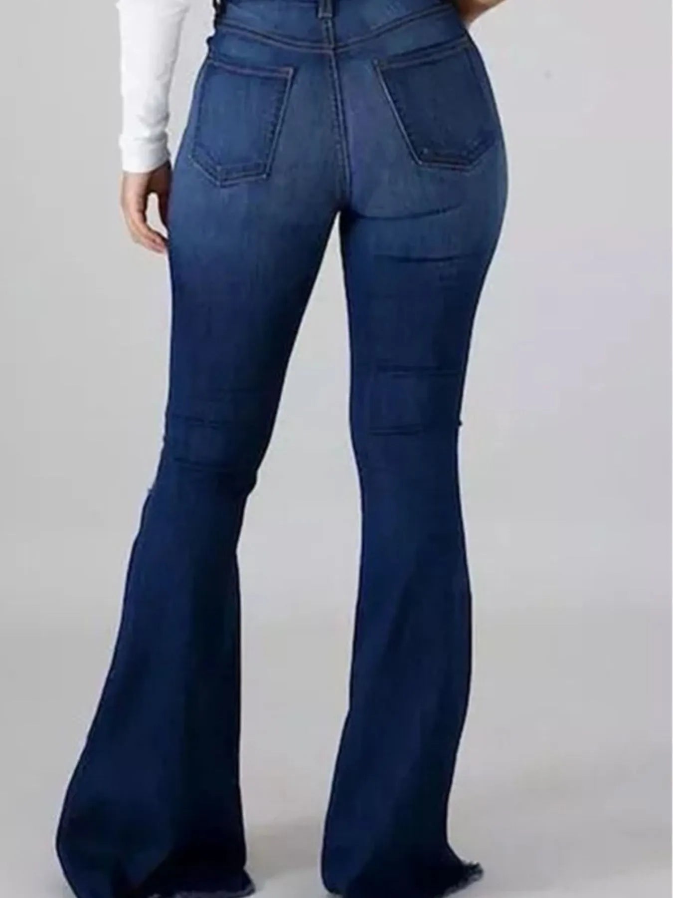 Full Size Plus Size Distressed Flare Jeans with Raw Hem.
