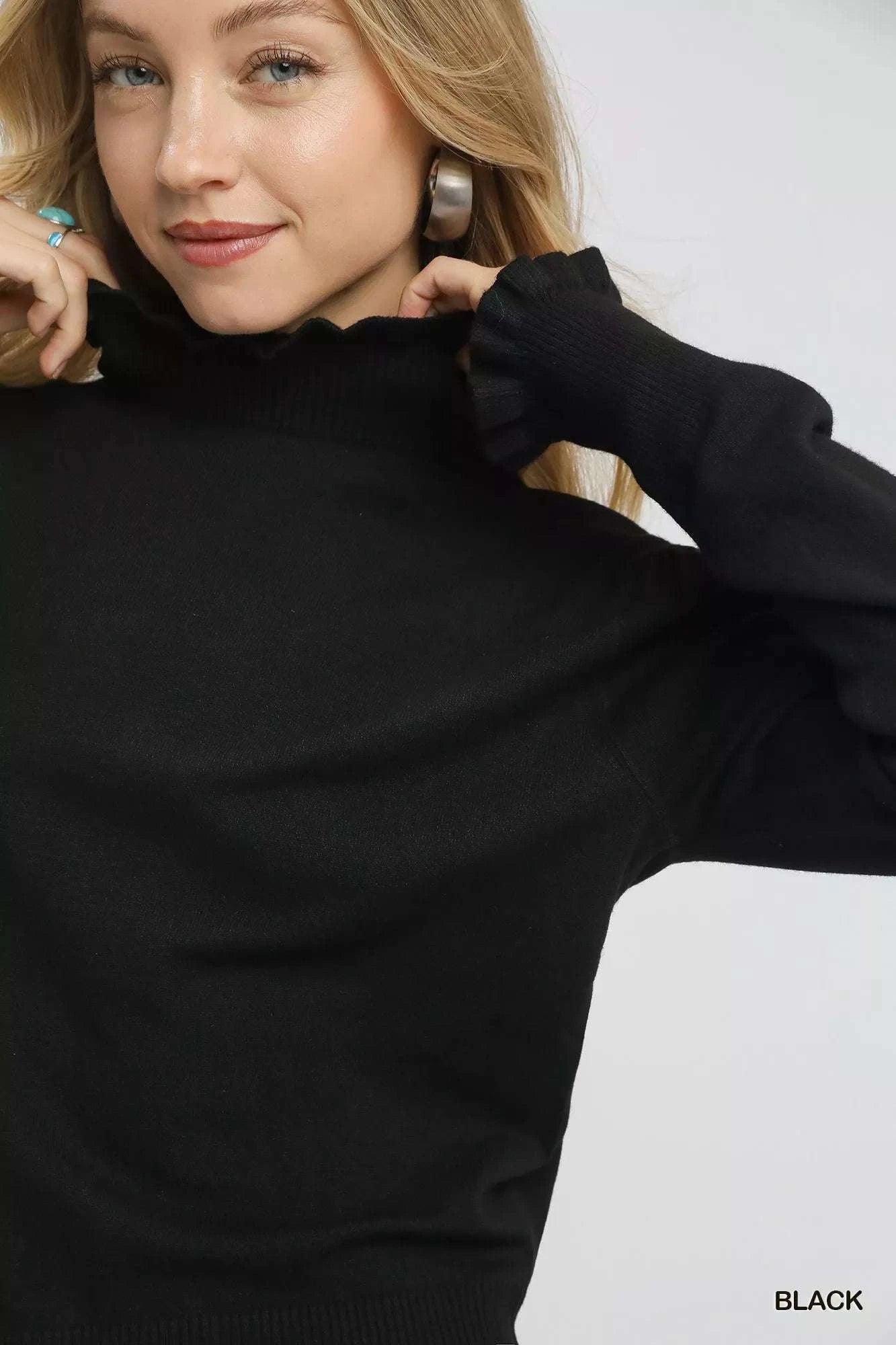 Ruffle Mock Neck Sweater for a Feminine and Chic Look.