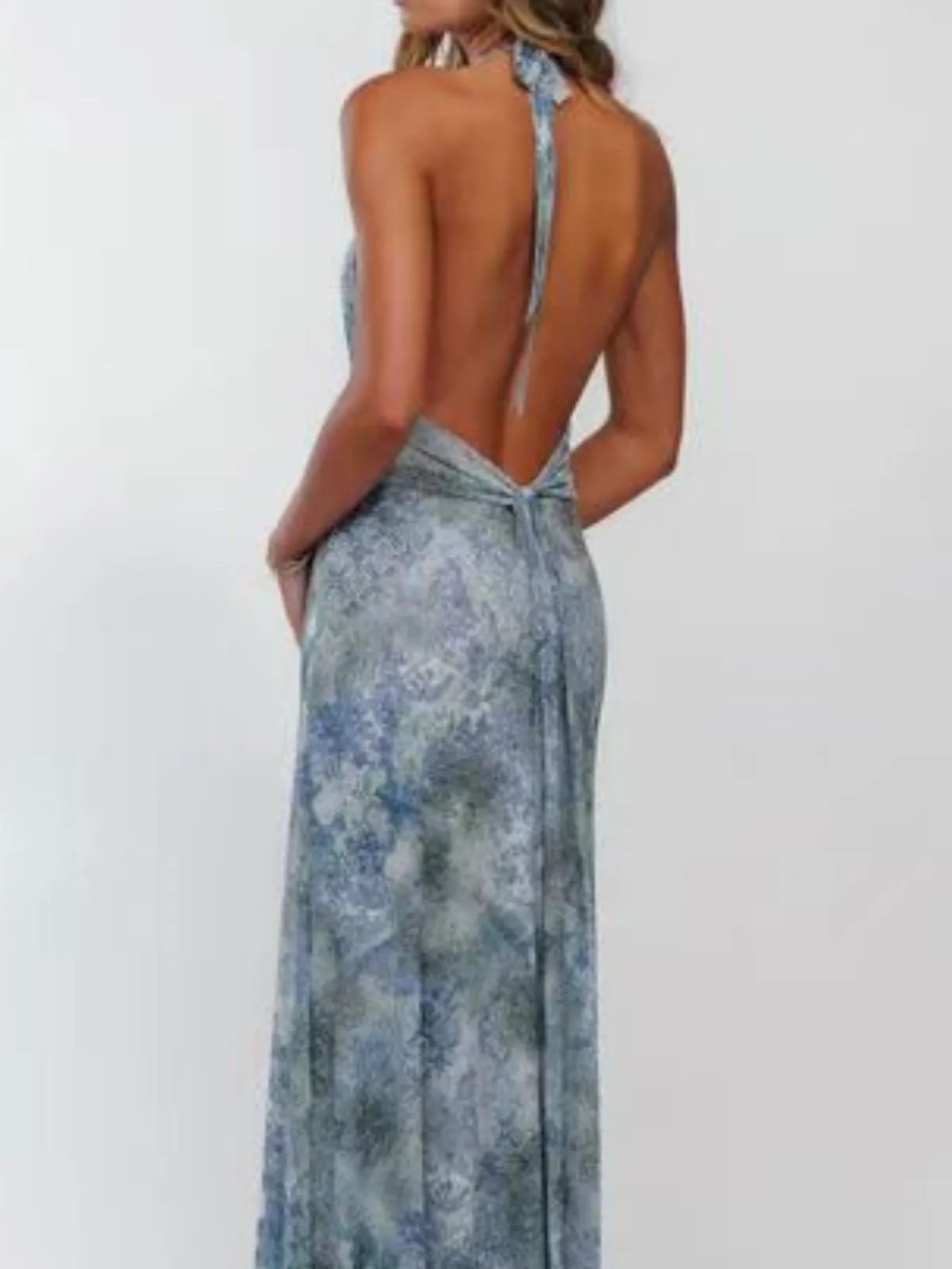 Floral Maxi Dress with Halter Neck and Deep V Design.