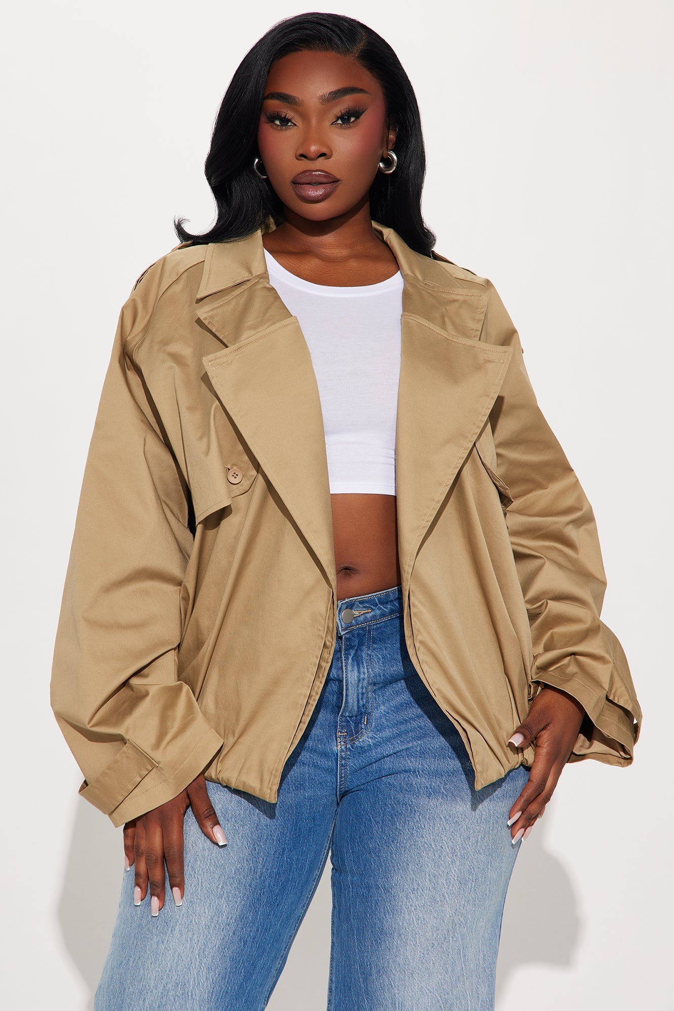 Marie Cropped Bubble Trench in taupe worn with white crop top and blue jeans, stylish trendy outerwear