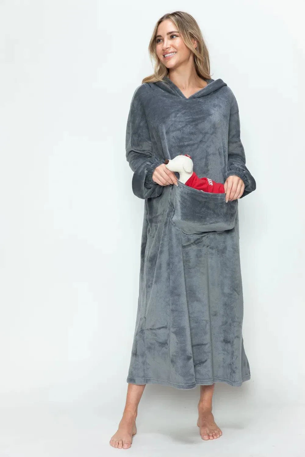 woman wearing gray hooded midi lounge dress with front pockets holding stuffed toy