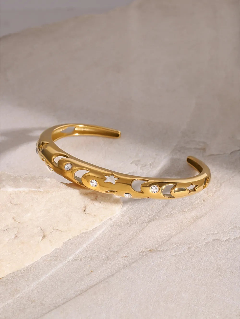 Stainless Steel Inlaid Rhinestone Cutout Bracelet.