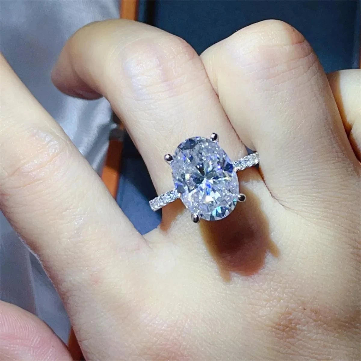 8 Carat Moissanite 925 Sterling Silver Ring with oval cut gemstone and platinum-plated band