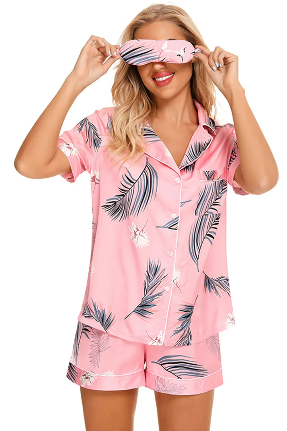 Pink printed button up short sleeve top and shorts lounge set with tropical leaf design