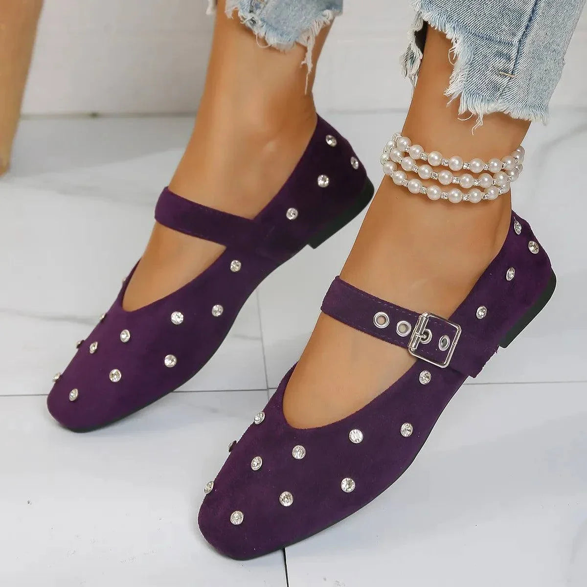 Purple Rhinestone Buckle Flat Mary Jane Loafers with pearl ankle bracelet on model wearing ripped jeans