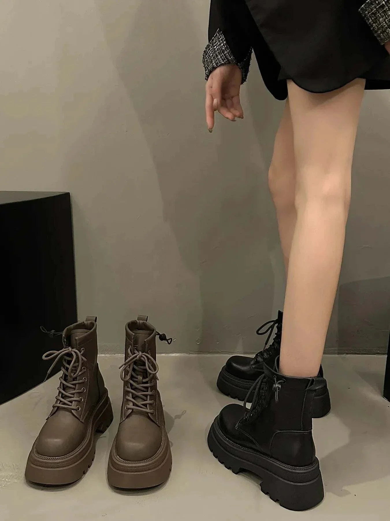Stylish lace up platform boots in black and brown with thick soles for elevated comfort and fashion