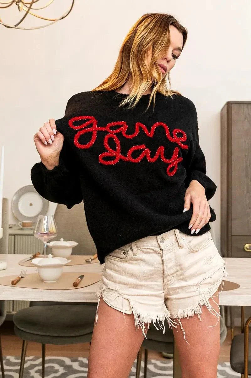 BiBi Game Day Metallic Letter SweaterShow your team spirit in style with this Game Day Metallic Letter Sweater. The metallic letter design adds a touch of glamour and sparkle to this sweater, perfect foRedemption By Ashley NorthGame Day Metallic Letter Sweater