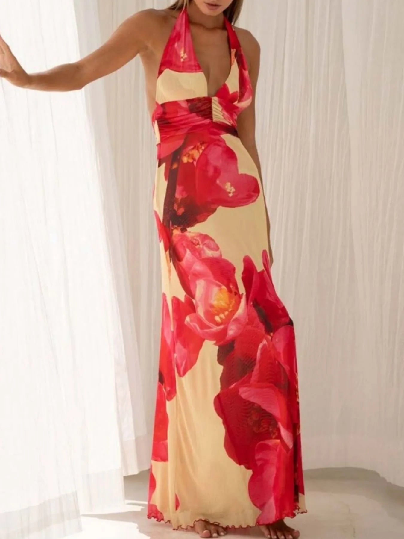 Floral Maxi Dress with Halter Neck and Deep V Design.
