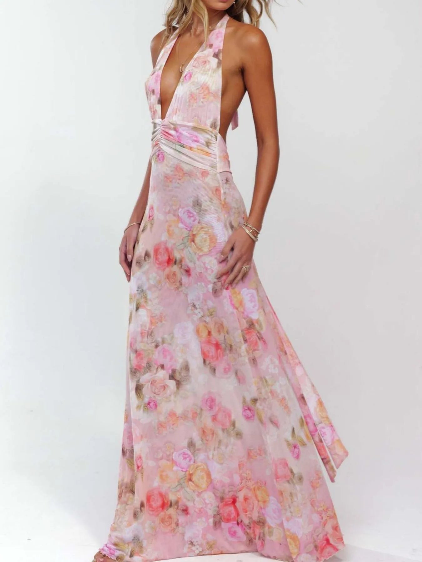 Floral Maxi Dress with Halter Neck and Deep V Design.