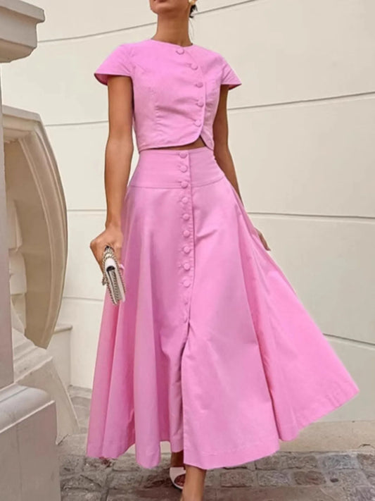 Pink buttoned short sleeve top and skirt set in 100% cotton, two-piece outfit with no stretch.