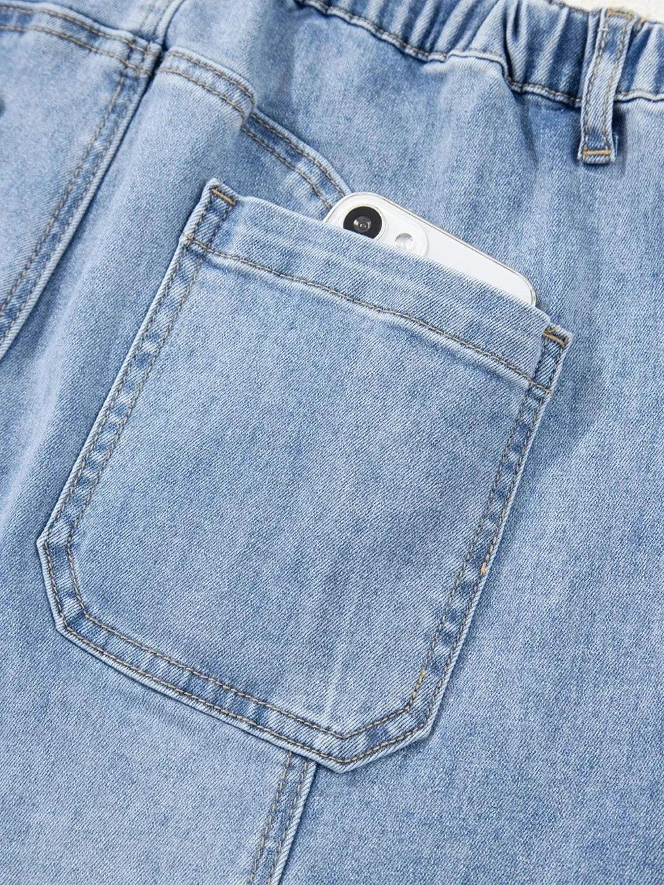 Wide Leg Drawstring Raw Hem JeansFeatures:Pocketed,Drawstring
Stretch:Slightly stretchy
Material composition:75% cotton, 23% polyester, 2% elastane
Care instructions:Machine wash cold. Tumble dry loRedemption By Ashley NorthWide Leg Drawstring Jeans