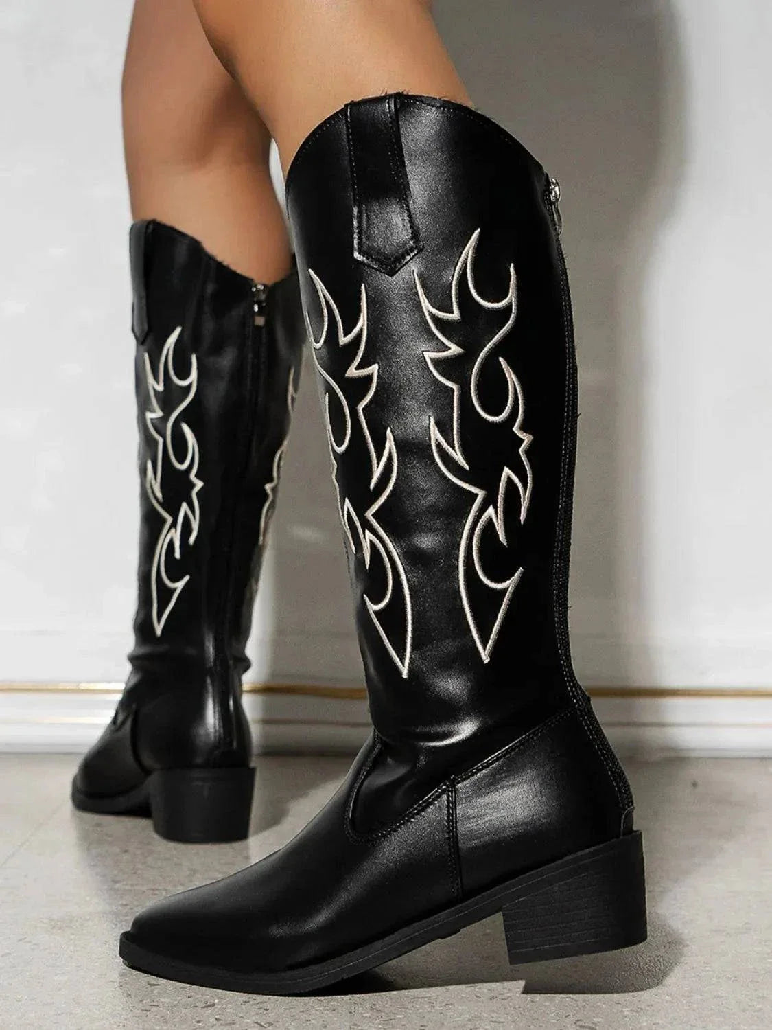 Black round toe block heel boots with white embroidery, stylish and comfortable knee-high design
