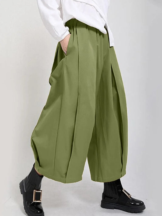Plus Size Pleated Cropped Pants with Wide Leg Detail.