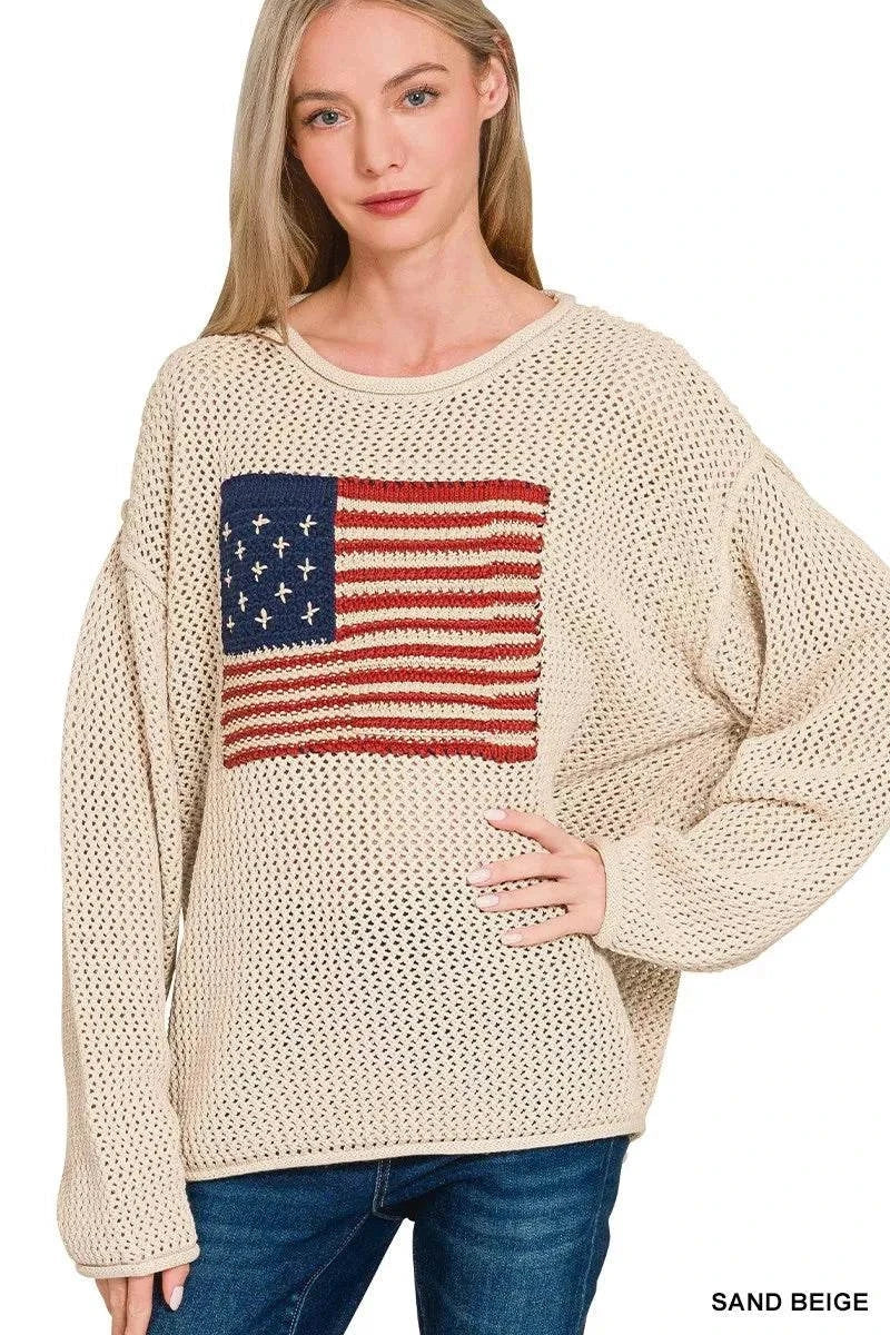 Sand beige American Flag crew neck sweater in openwork knit design worn by woman