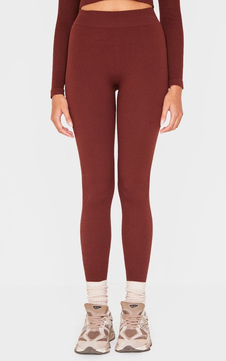 Brown structured contour ribbed leggings styled with casual sneakers and socks