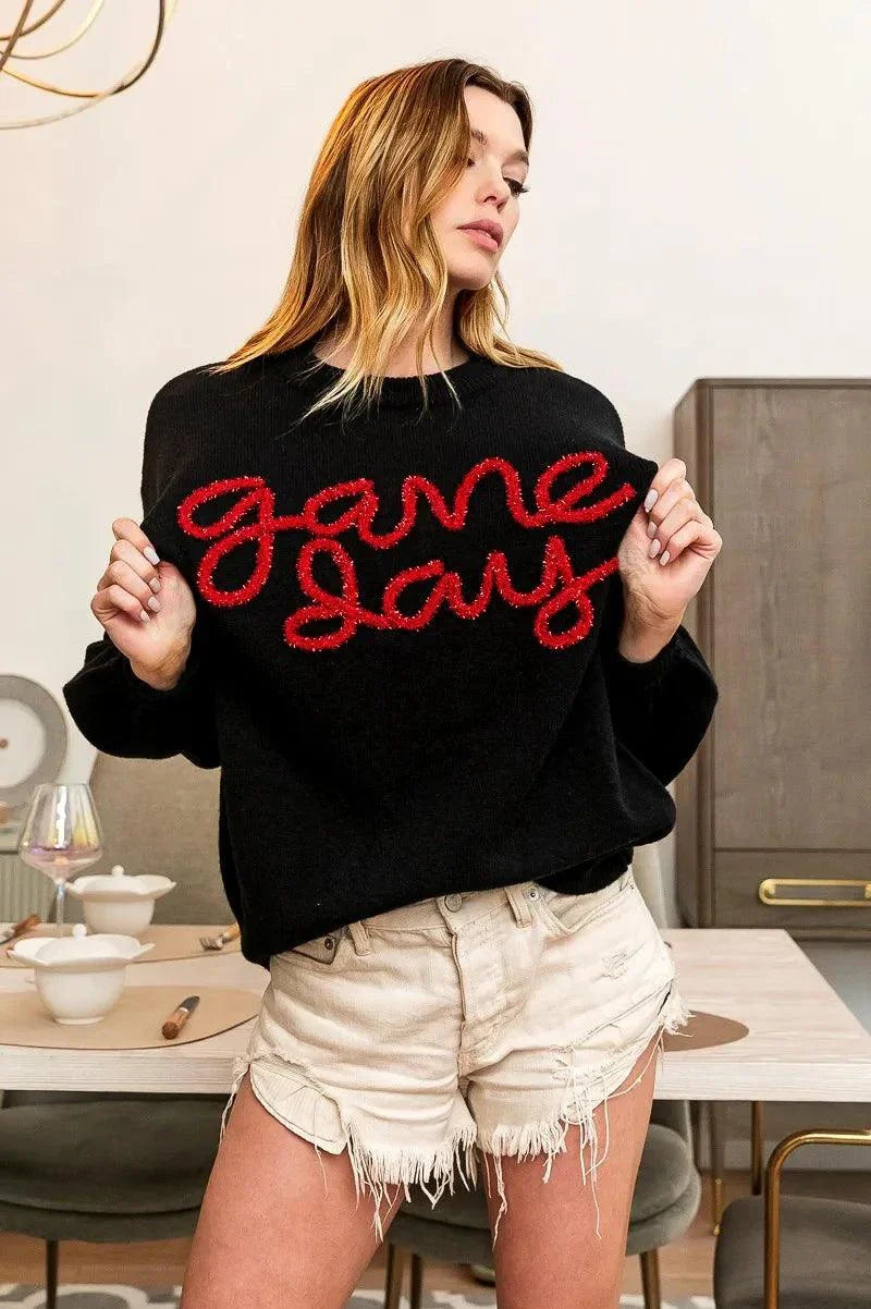 BiBi Game Day Metallic Letter SweaterShow your team spirit in style with this Game Day Metallic Letter Sweater. The metallic letter design adds a touch of glamour and sparkle to this sweater, perfect foRedemption By Ashley NorthGame Day Metallic Letter Sweater