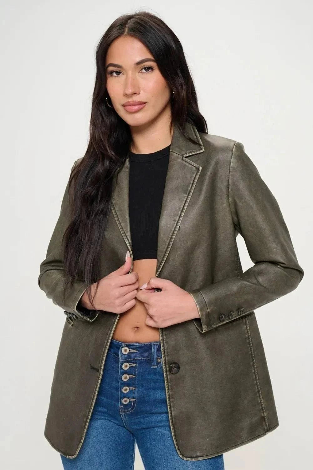 Coalition LA Single-Breasted Vegan Leather BlazerThis single-breasted vegan leather blazer offers a sleek and stylish look. Made from cruelty-free materials, it's a chic and ethical choice. Perfect for adding a touRedemption By Ashley NorthCoalition LA Single-Breasted