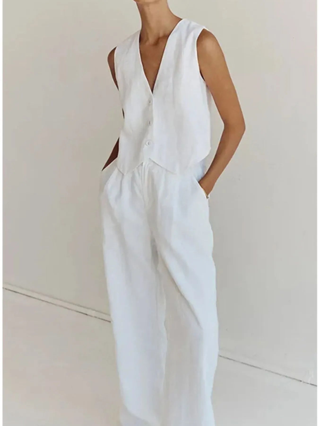 Full Size Plus Size Vest and Pants Set with Wide Leg Trim.