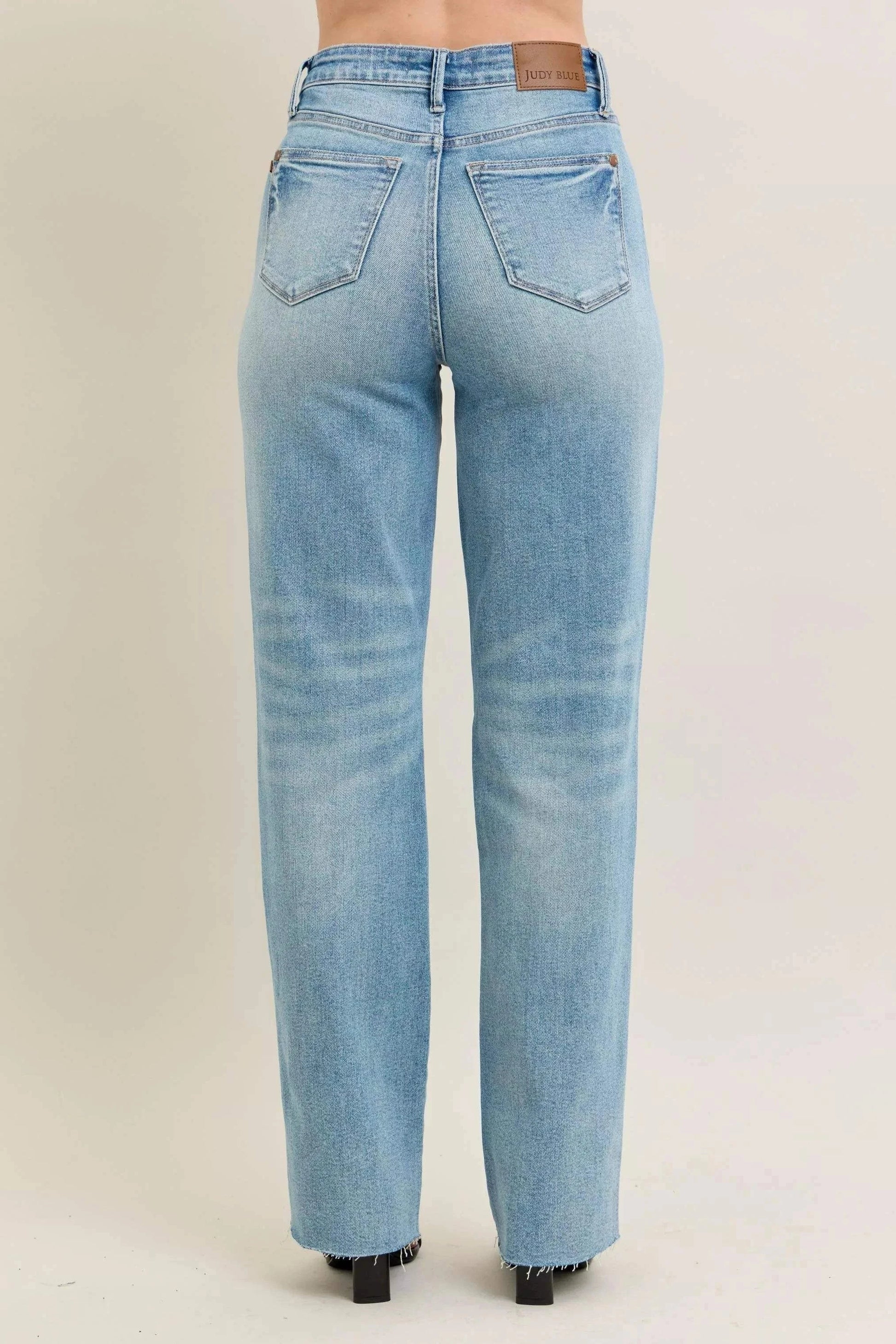 Back view of Judy Blue Plus Size 90's high waist straight jeans in light blue rigid denim