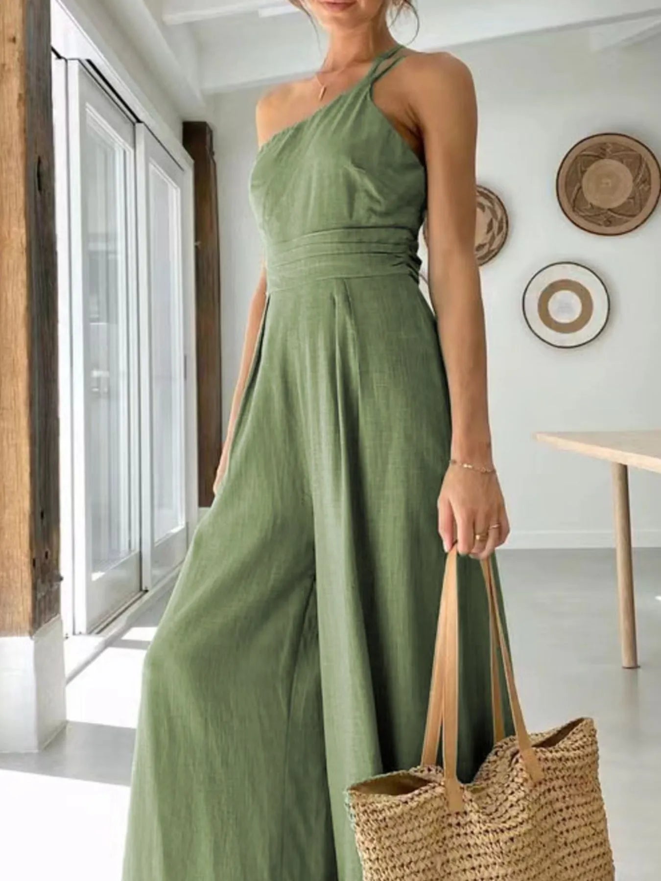 Single Shoulder Jumpsuit with Wide Leg Design.