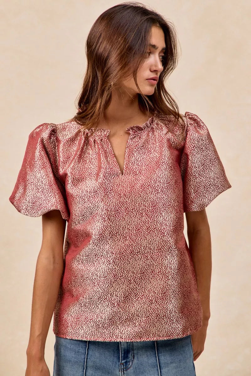 Woman wearing BiBi Jacquard Woven short balloon sleeves V neck top in pink with ruffle detail