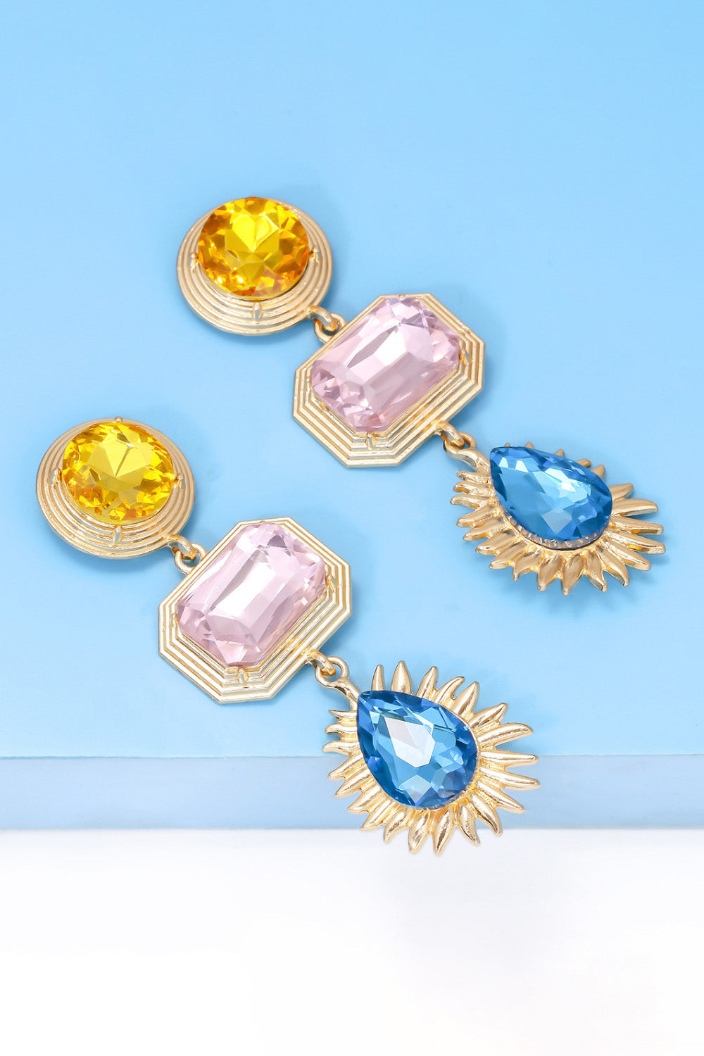 Geometrical shape zinc alloy frame glass dangle earrings with yellow, pink, and blue stones.
