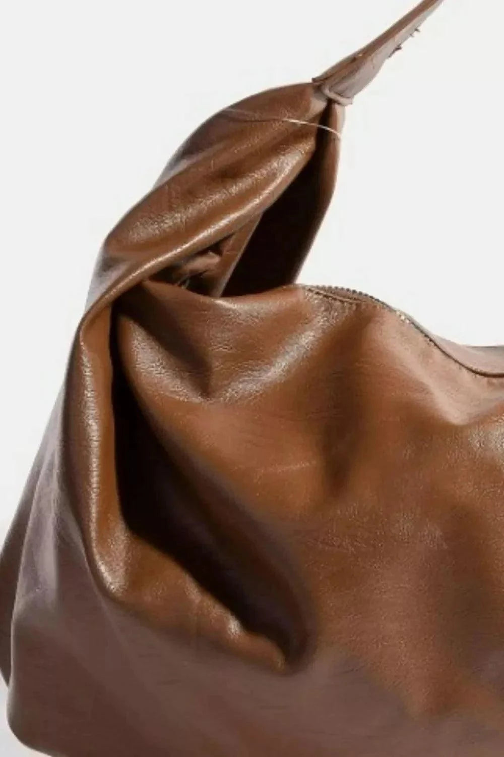 Fame Simple Faux Leather Hobo Shoulder BagAdd a touch of understated elegance to your ensemble with the simple faux leather hobo shoulder bag. This versatile bag features a minimalist design perfect for everRedemption By Ashley NorthFame Simple Faux Leather