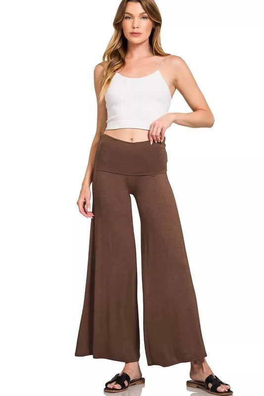 Zenana Fold Over Waist comfy wide-leg brown pants with pockets modeled by woman in white crop top