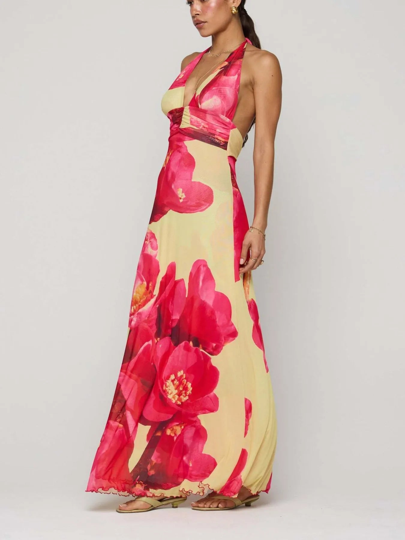 Floral Maxi Dress with Halter Neck and Deep V Design.