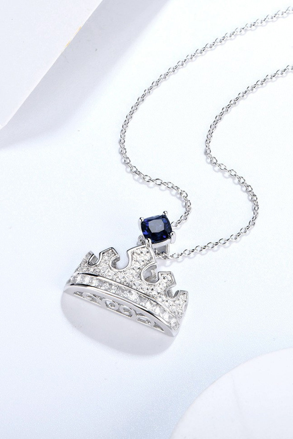 Minimalist zircon and lab-grown sapphire crown pendant necklace in platinum-plated 925 sterling silver with matching box