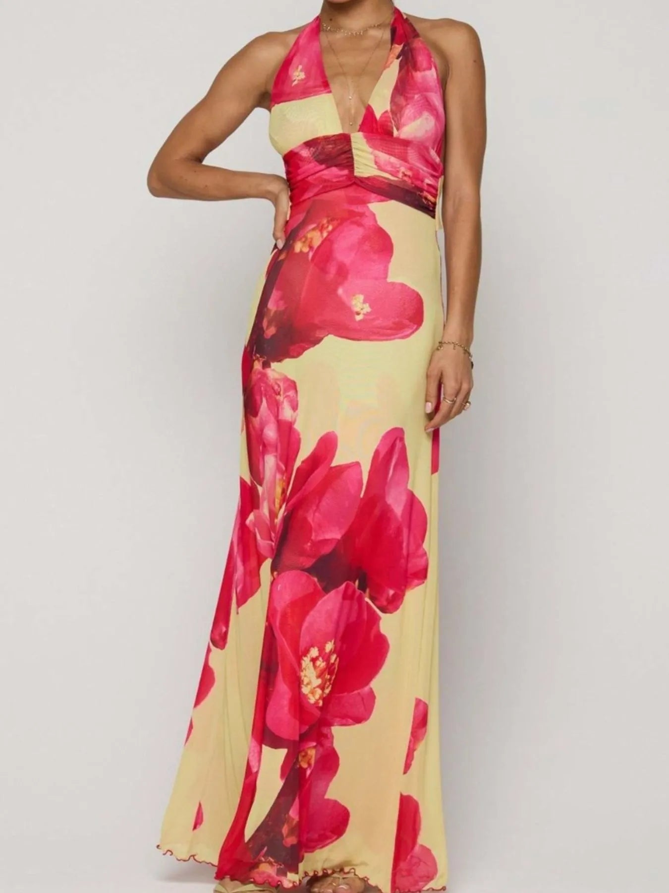 Floral Maxi Dress with Halter Neck and Deep V Design.