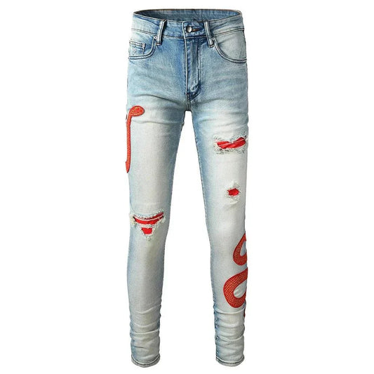 Blue red embroidered snake patch distressed skinny jeans with high-quality denim and unique design