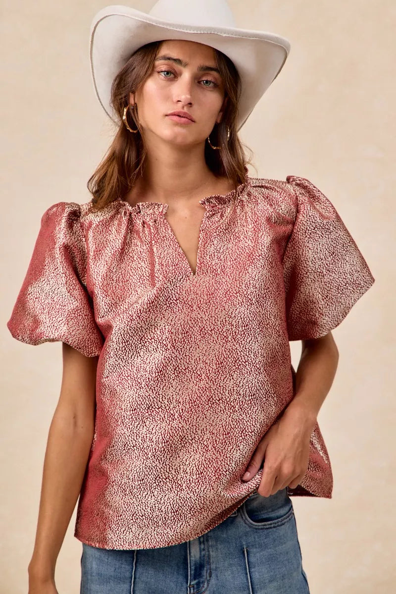 Woman wearing BiBi Jacquard Woven short balloon sleeves V neck top with ruffled details and jeans