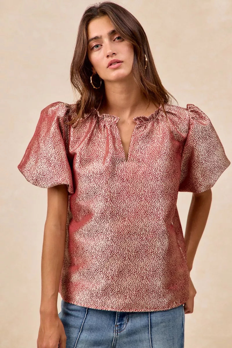 Woman wearing BiBi Jacquard Woven short balloon sleeves V neck top in pink pattern