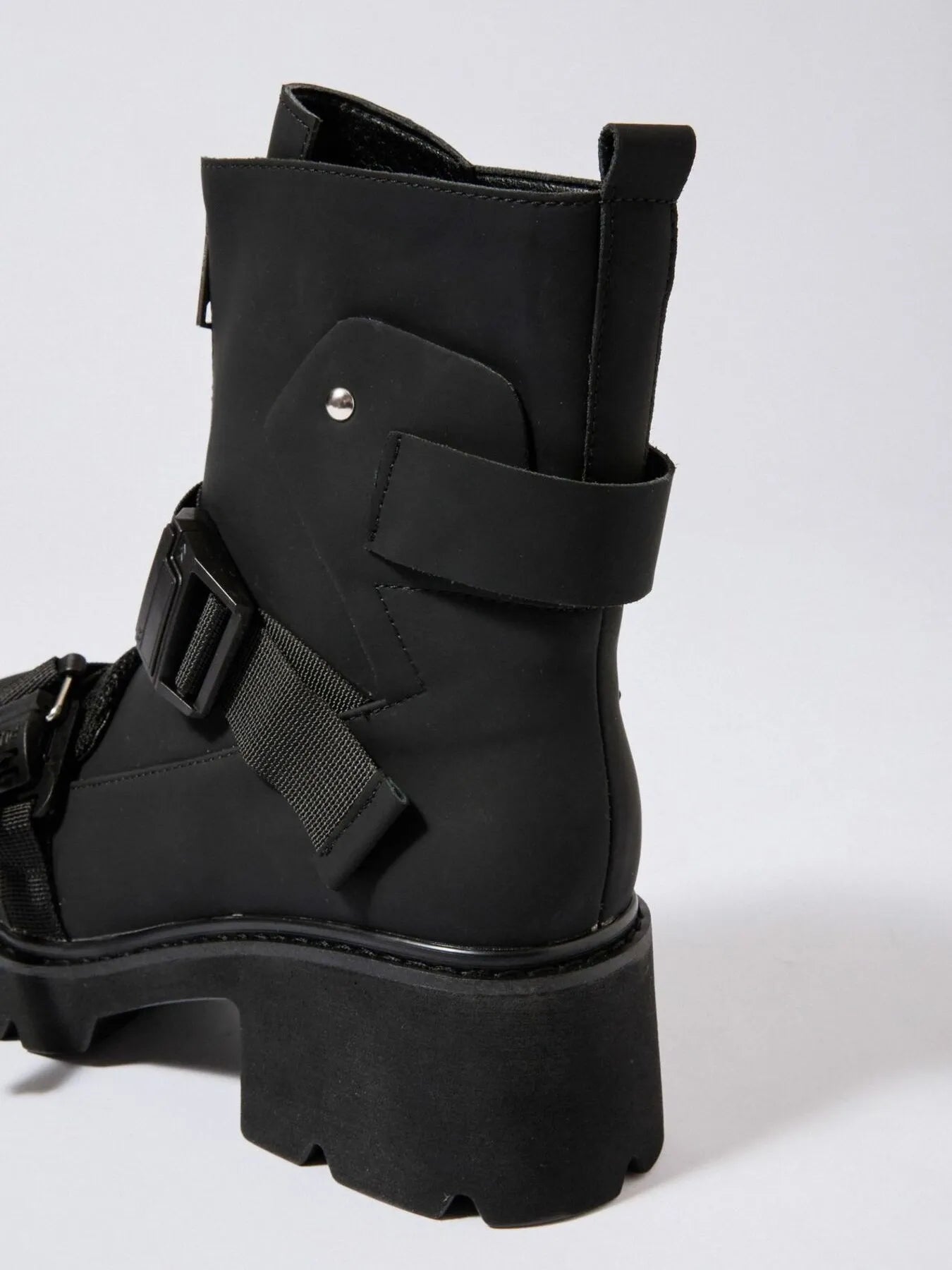 Chunky Platform Boots with Buckle Straps and Front Zip - Stylish Footwear for Every Occasion.