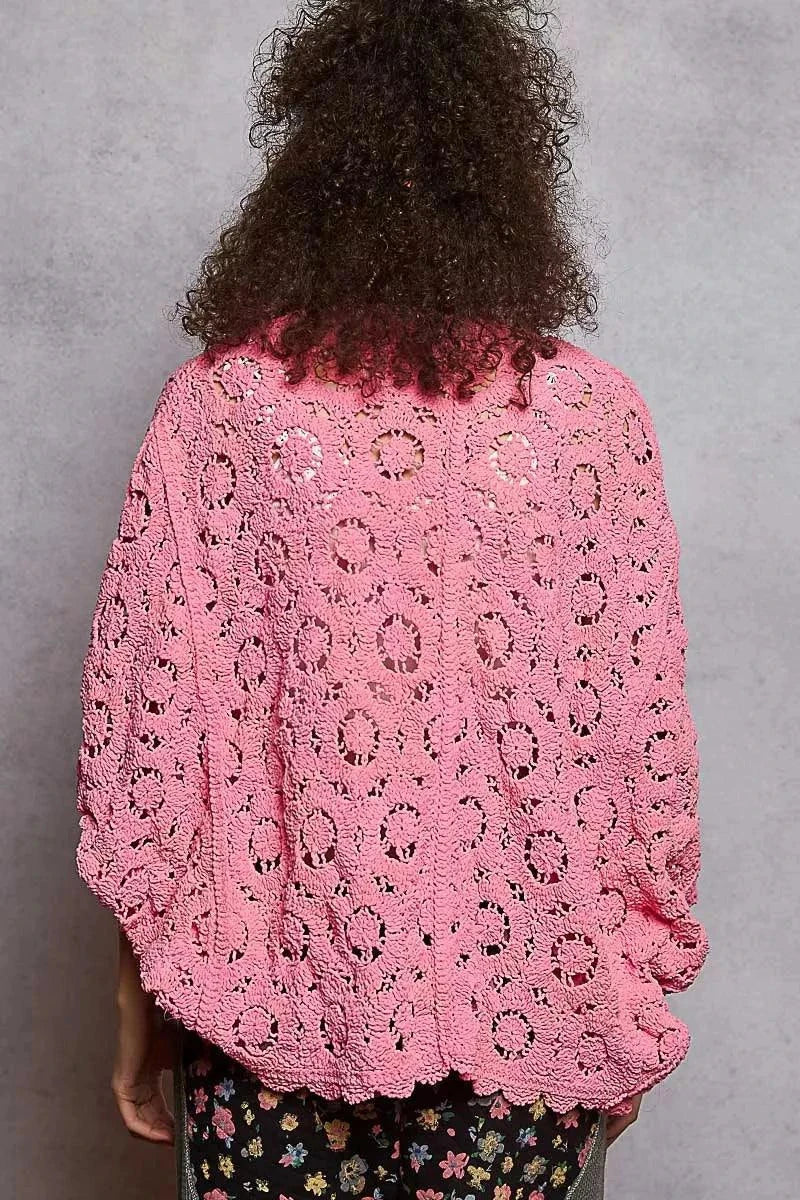 Back view of POL floral pattern open front pink cardigan with batwing sleeves and openwork design