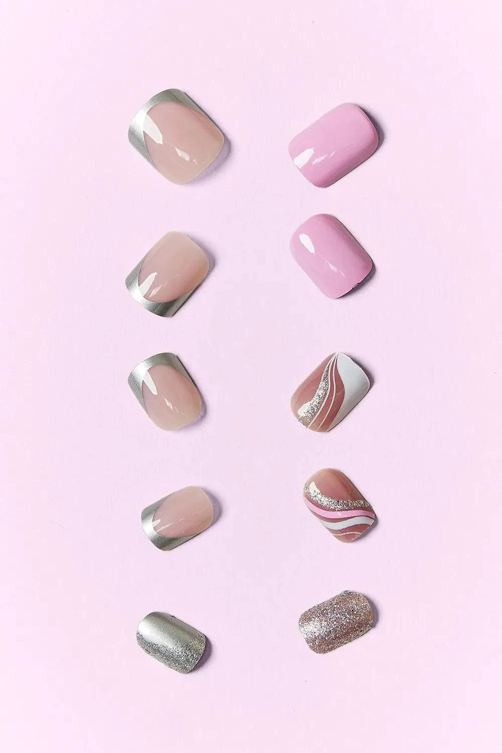 SO PINK BEAUTY press-on nails two packs with pink, silver, and nude designs on a pink background