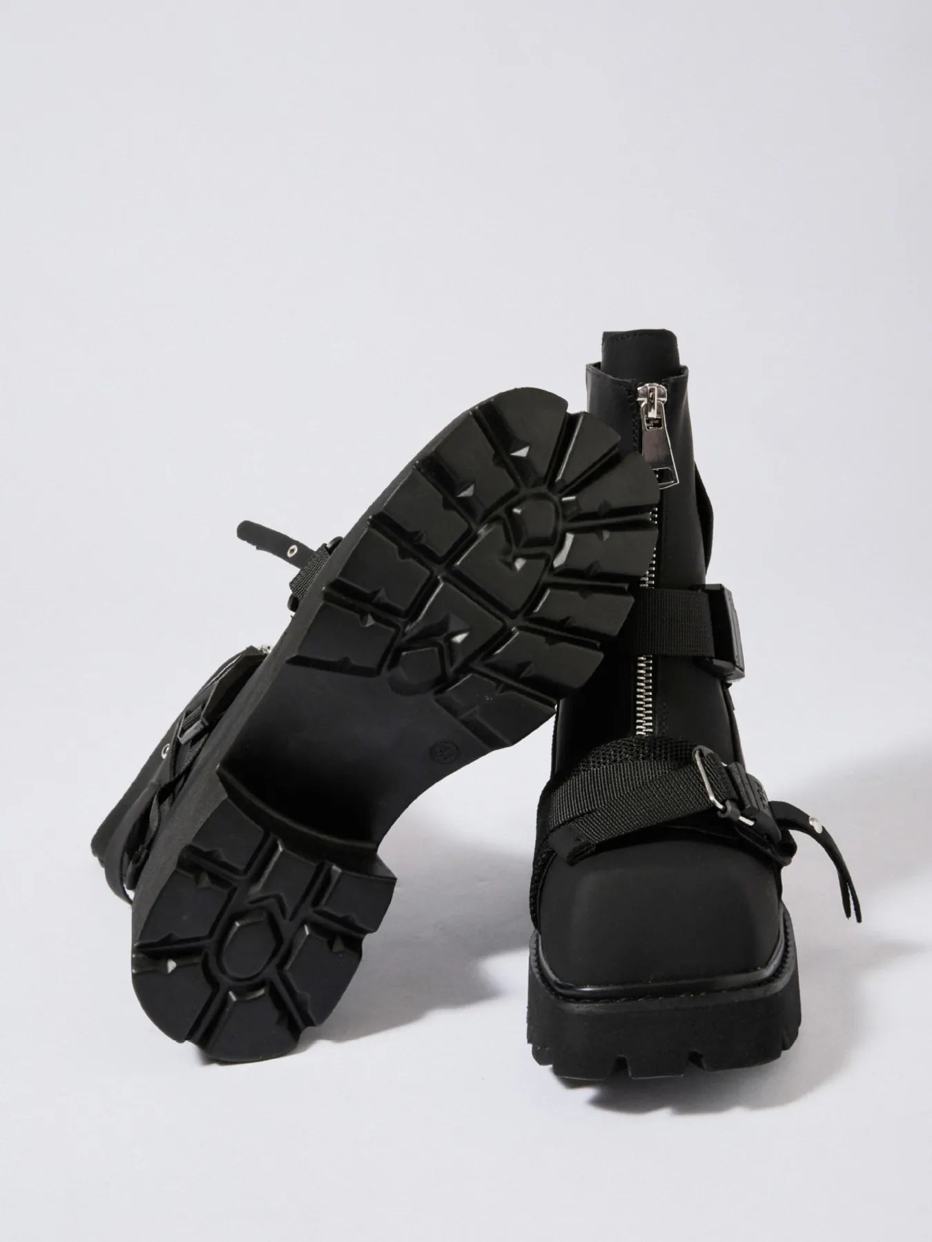 Chunky Platform Boots with Buckle Straps and Front Zip - Stylish Footwear for Every Occasion.