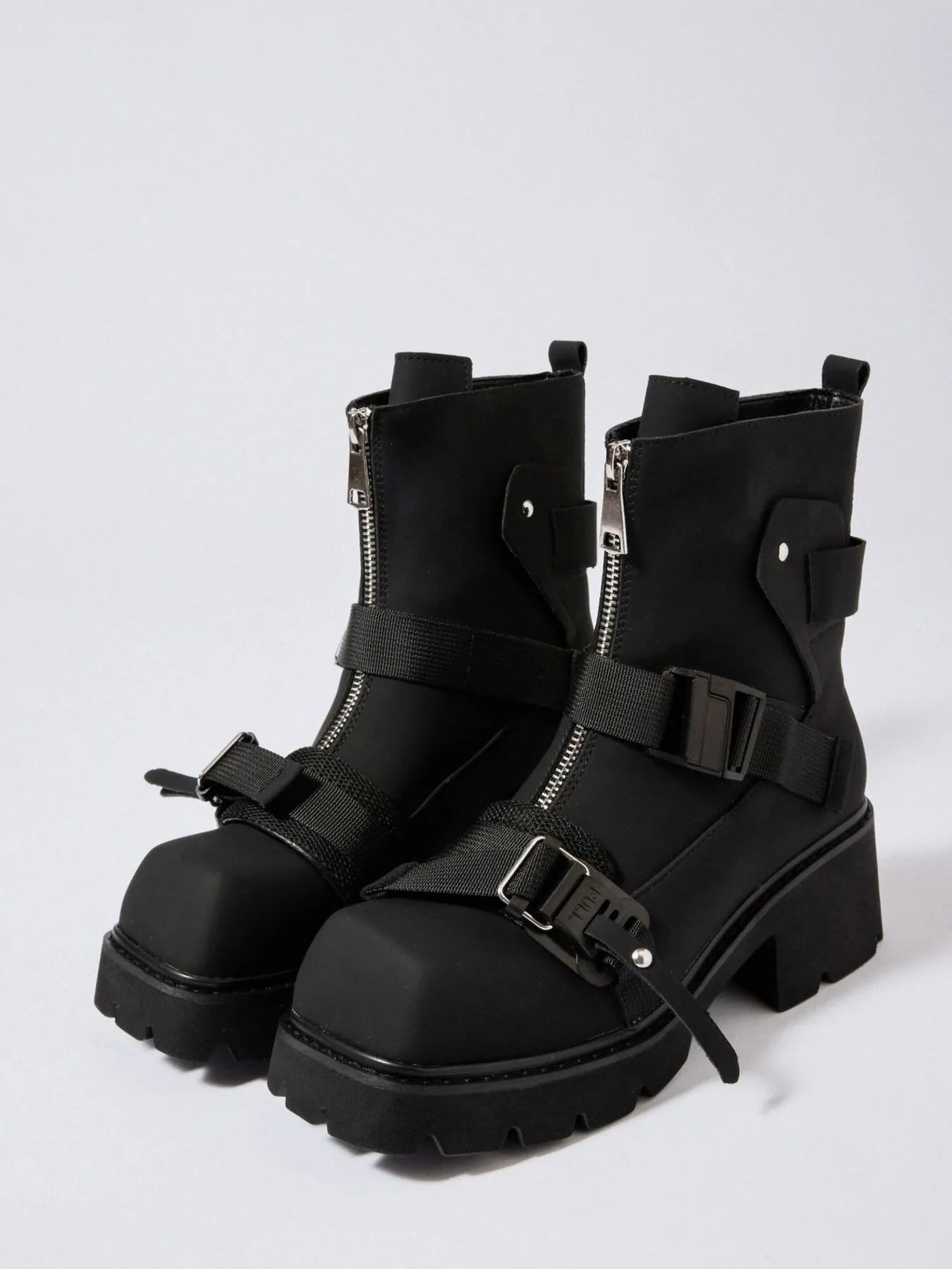 Chunky Platform Boots with Buckle Straps and Front Zip - Stylish Footwear for Every Occasion.