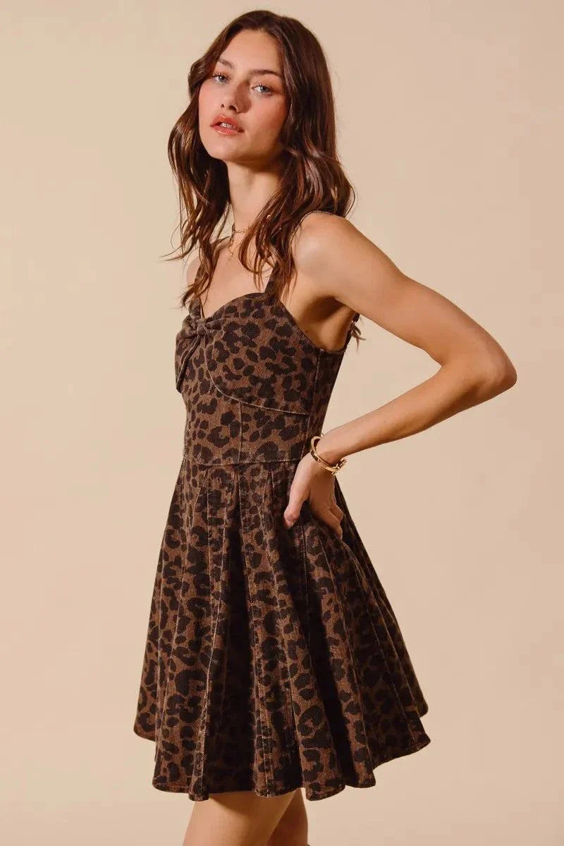 SO ME mineral washed leopard print flare cami dress worn by model against beige background