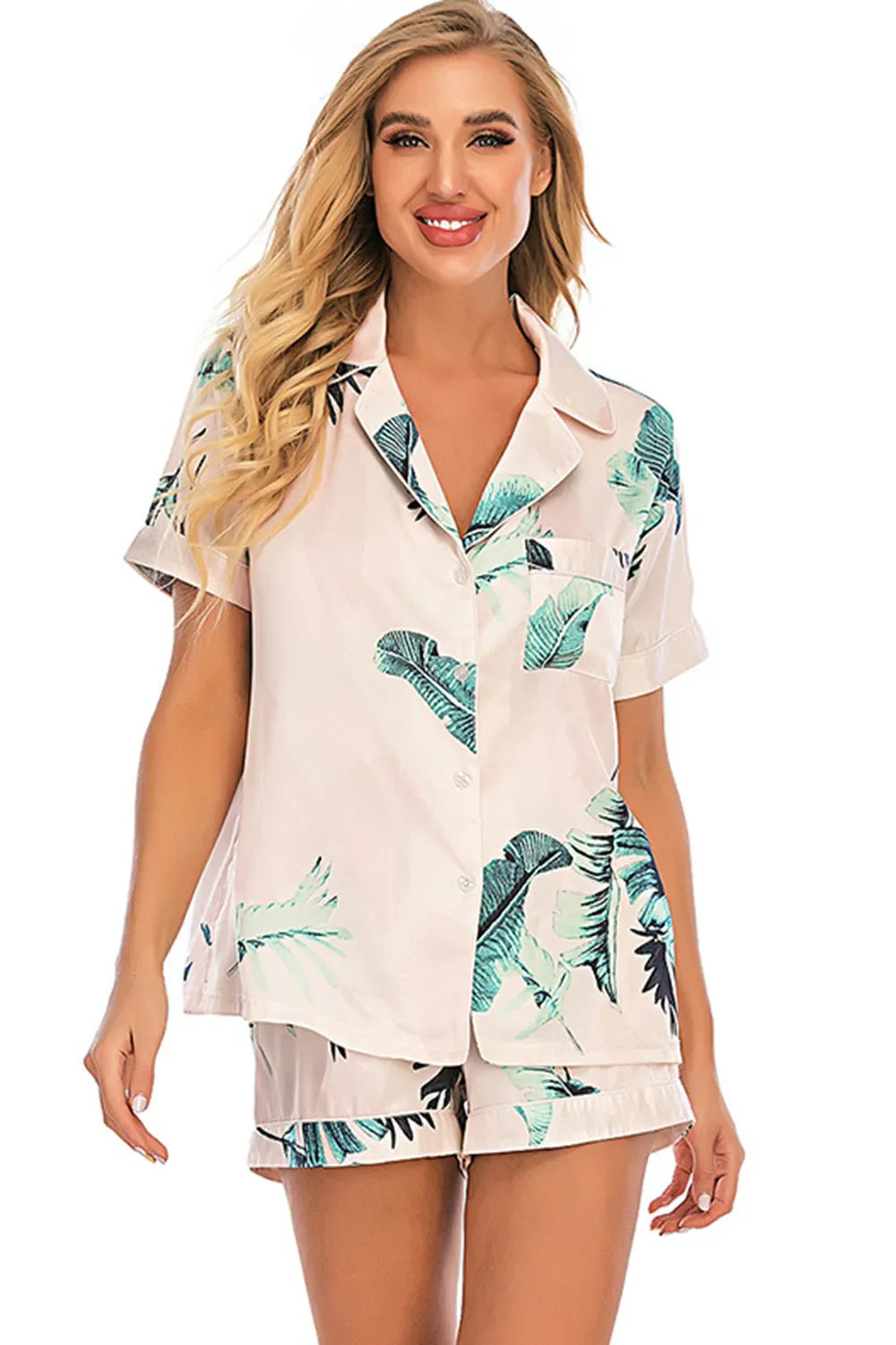 Printed button up short sleeve top and shorts lounge set with tropical leaf print and stretchy polyester blend fabric