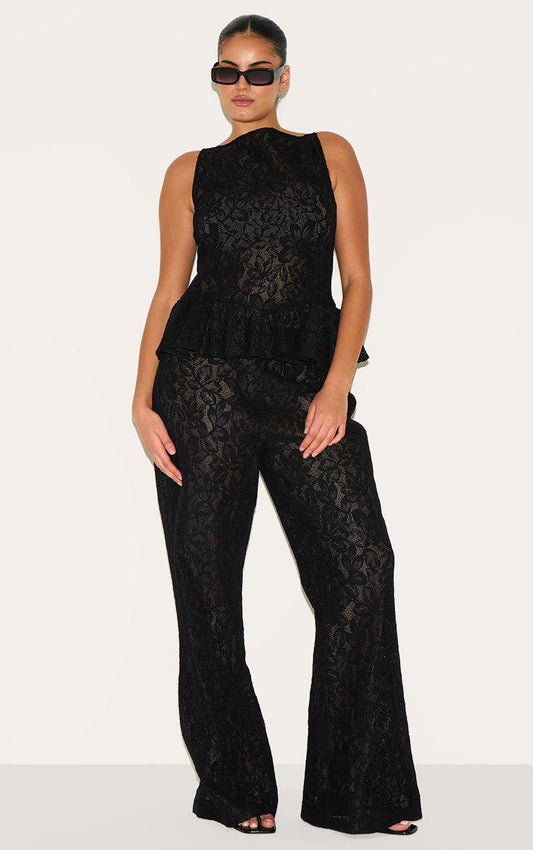 Plus Black Sheer Lace Flared Leg TrouserFinished with intricate detailing, these trousers are made from a black sheer lace material with a flattering flared high waisted fit. For the perfect co-ord, style Redemption By Ashley NorthPlus Black Sheer Lace