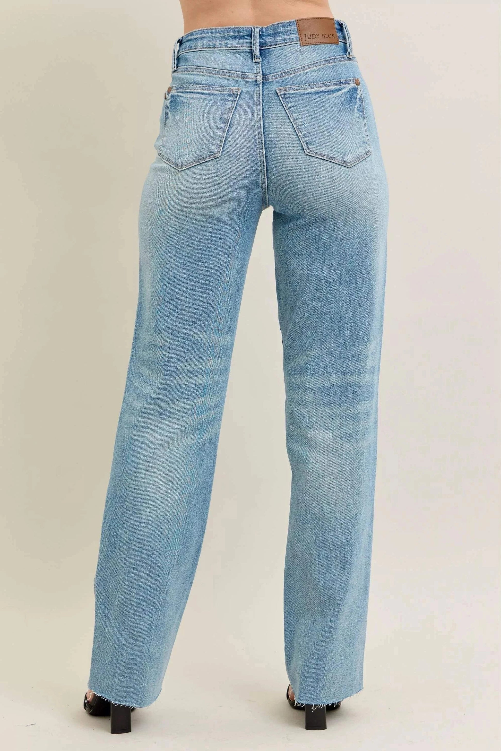 Judy Blue Plus Size 90's high waist straight light wash jeans with star-shaped destructed details back view
