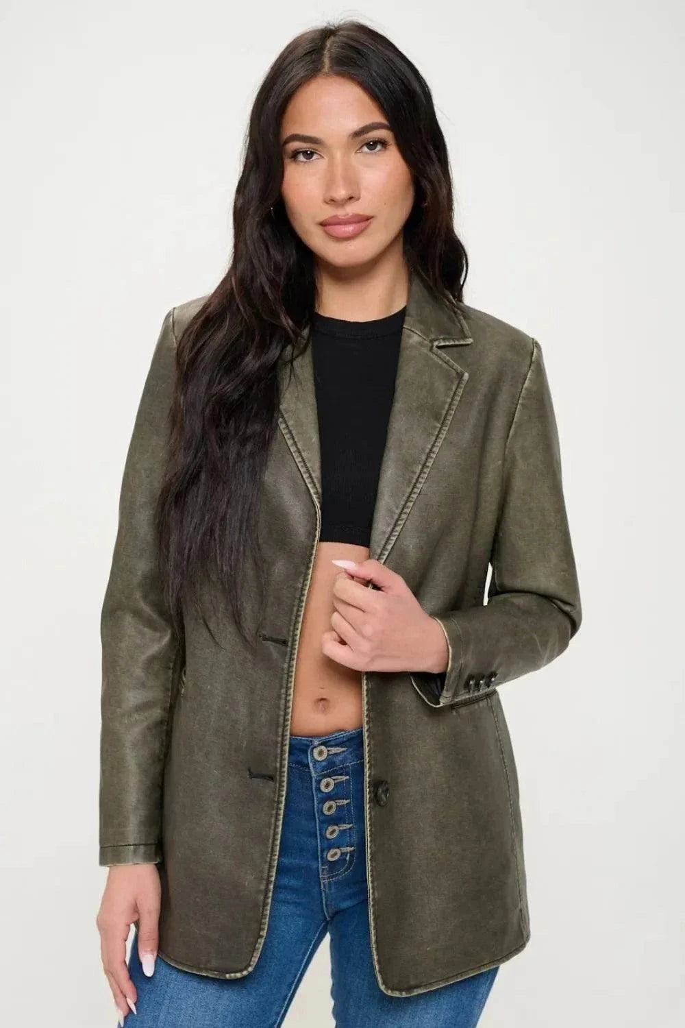 Coalition LA Single-Breasted Vegan Leather BlazerThis single-breasted vegan leather blazer offers a sleek and stylish look. Made from cruelty-free materials, it's a chic and ethical choice. Perfect for adding a touRedemption By Ashley NorthCoalition LA Single-Breasted