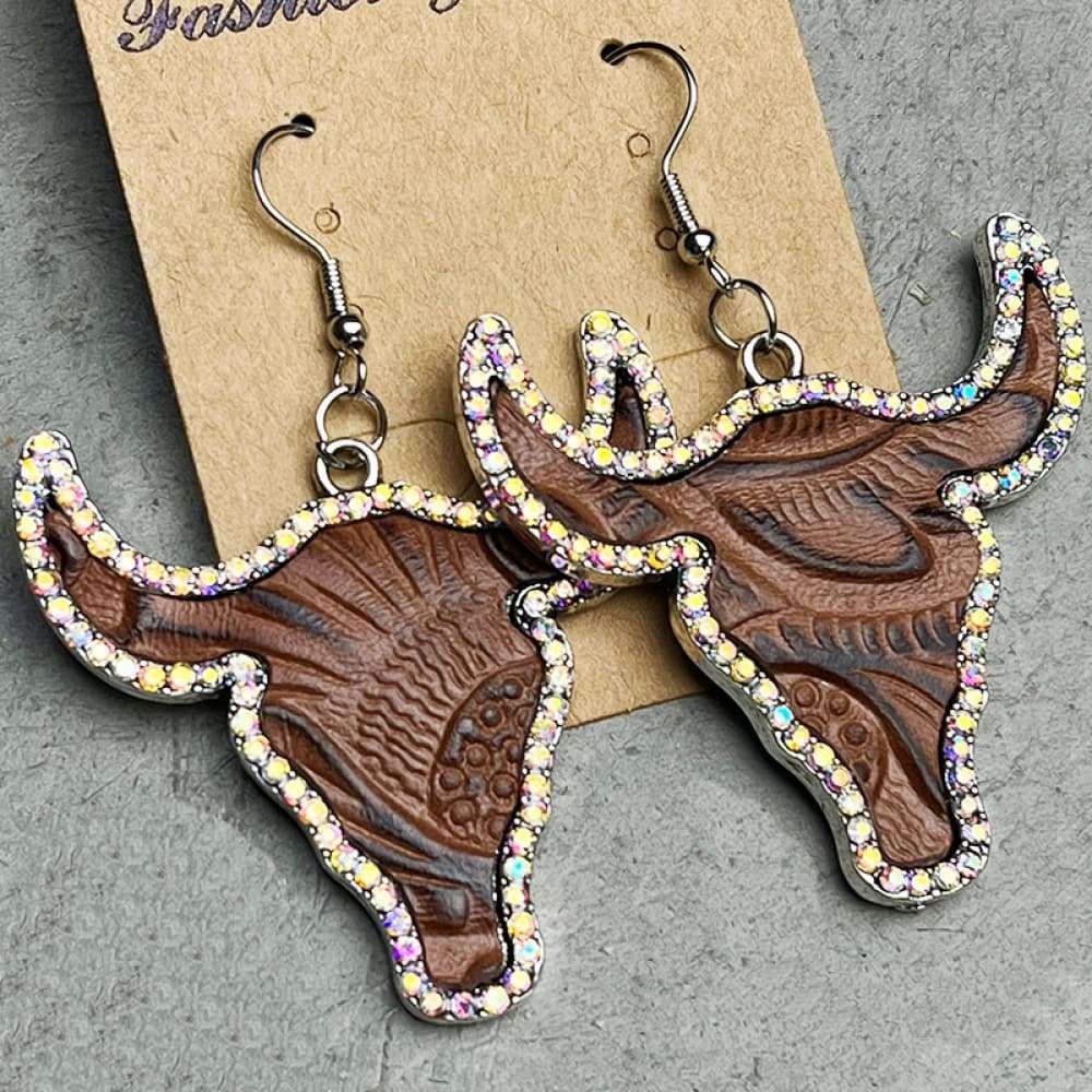 Western style rhinestone trim alloy bull earrings with intricate design and 2.6 inch length