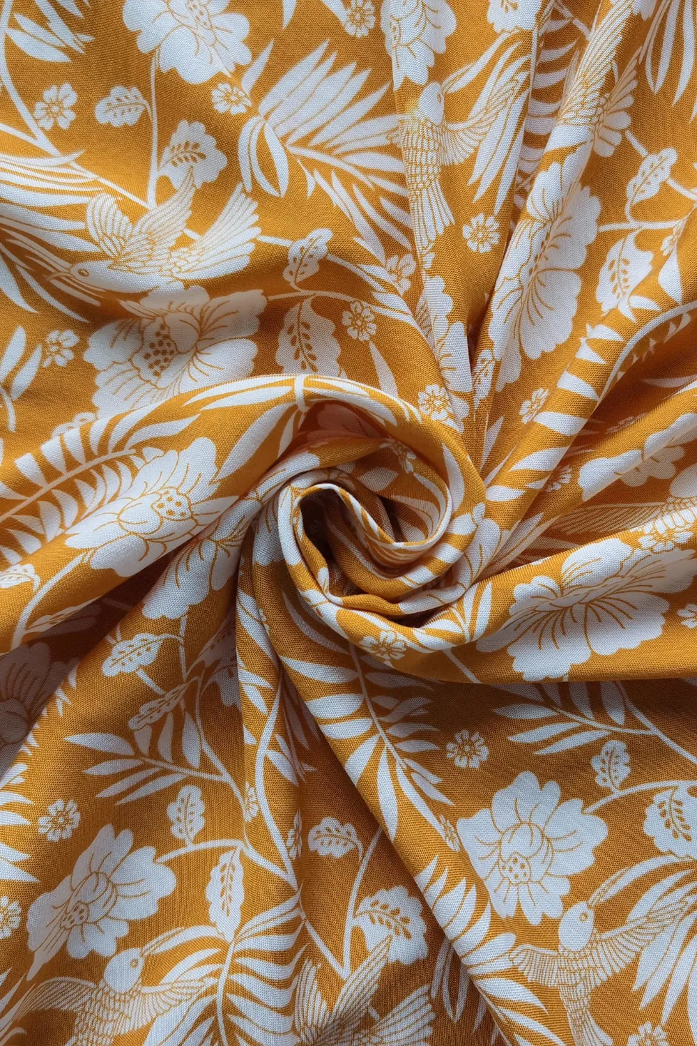 Yellow printed viscose fabric for half sleeve top and slit skirt set