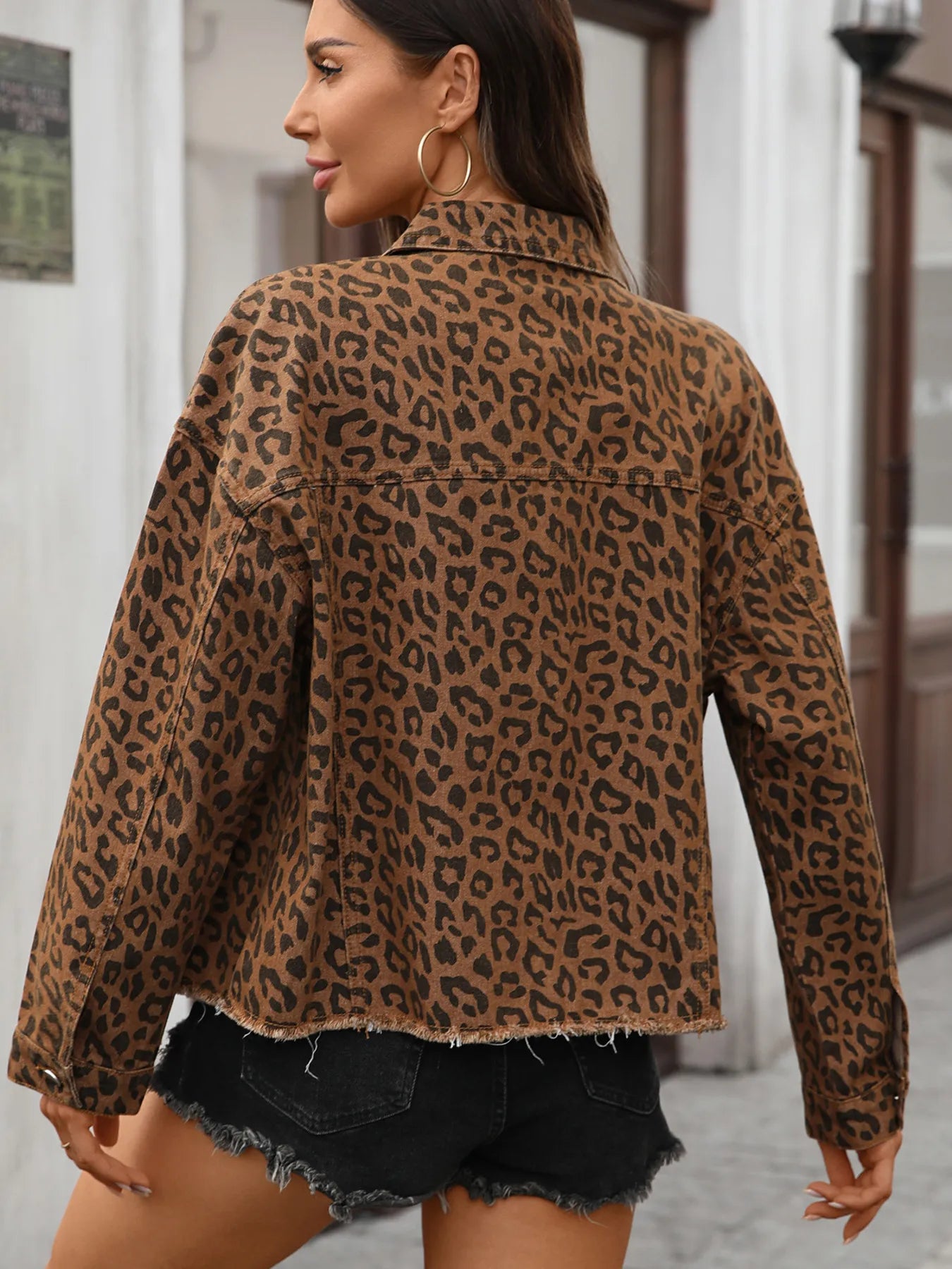 Leopard Print Denim Jacket with Raw Hem Detail.