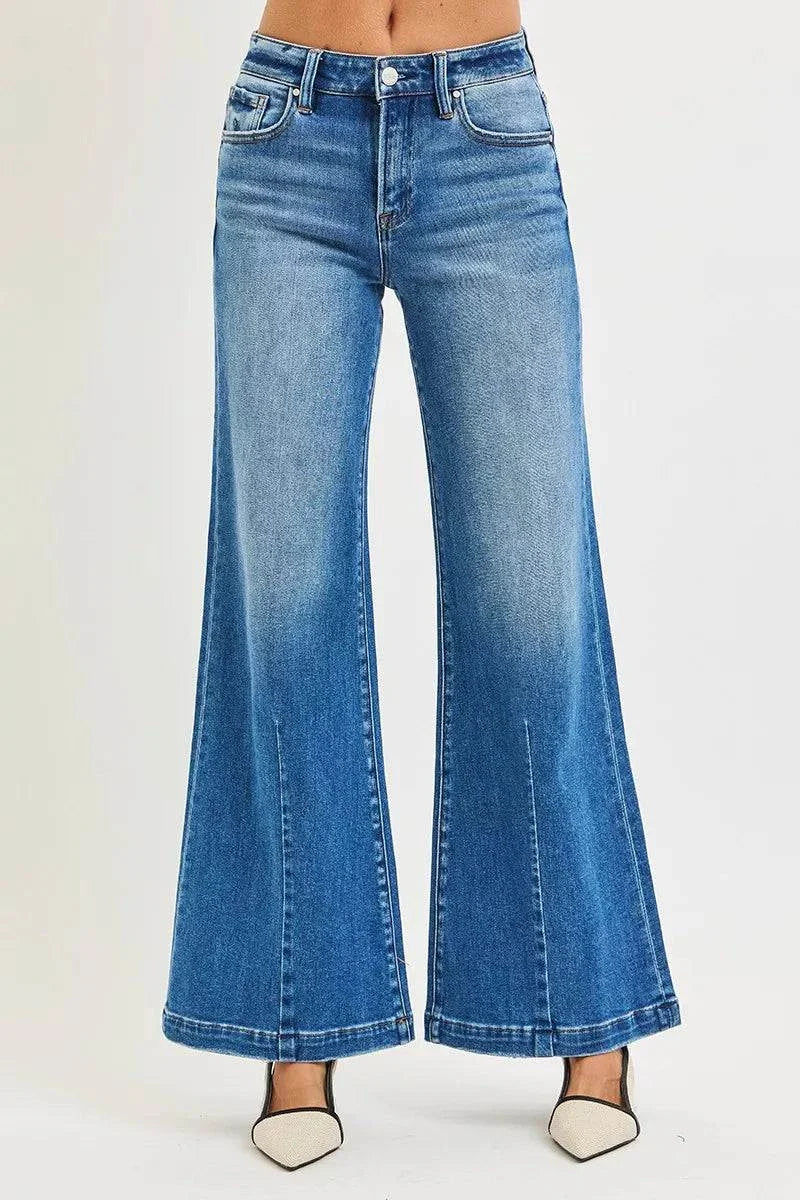 RISEN Full Size Mid Rise Wide Leg Jeans with Flared Look Plus SizeThese Mid Rise Wide Leg Jeans With Flared Look are a statement piece for a retro-inspired outfit. The mid rise waist provides a flattering fit and silhouette. The wiRISEN Full Size