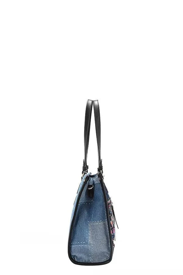 Nicole Lee USA Bosque de Amor medium denim tote bag with vegan leather accents and adjustable straps side view